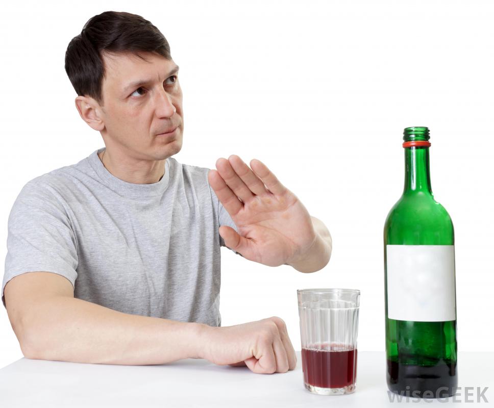 man-refusing-bottle-of-wine.jpg